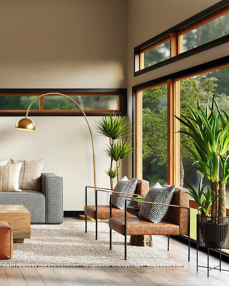Earthy living room with a low beige sofa, terracotta ottomans and a long clerestory window